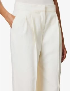 Alexander McQueen Pleated Folded-hem Wide-leg Mid-rise Wool Trousers -Mode Charm Shop R04136272 LIGHTIVORY ALT04
