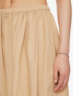 Ganni Tiered-hem Relaxed-fit Organic-cotton Midi Skirt -Mode Charm Shop R04152897 CURDSANDWHEY ALT04